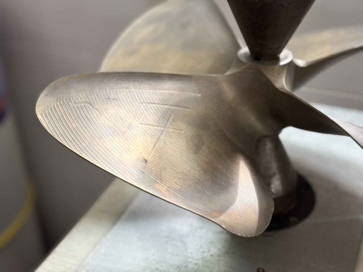 Used propeller showing wear before repair